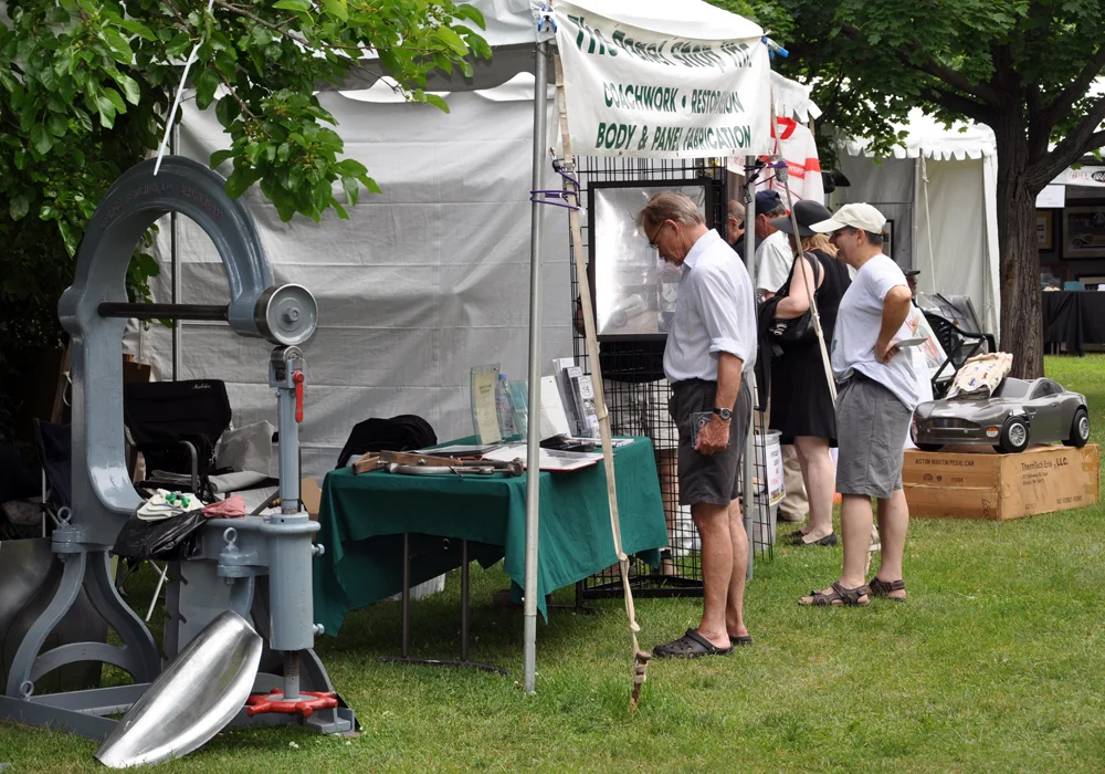 Panel shop exhibit illustrates skill & coach-building craft.