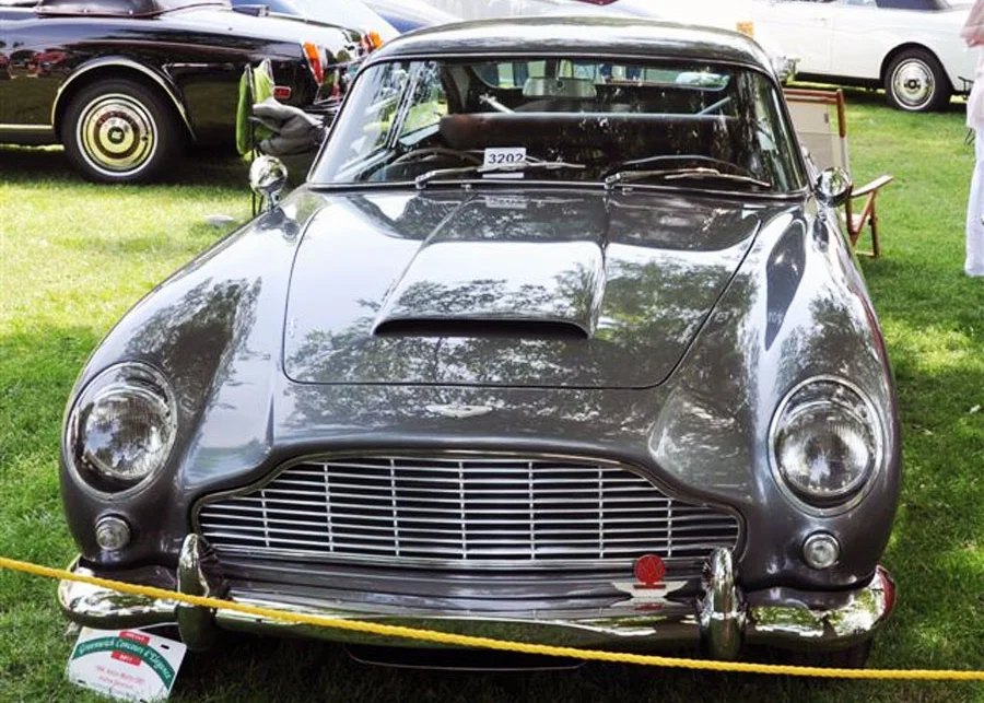 Andrew Bennenson’s ARI-restored Aston Martin DB5 waits in the shade, soon to be awarded