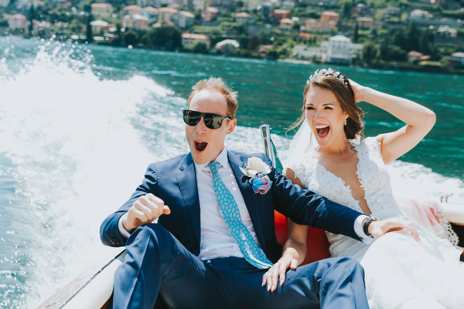 The couple out on Lake Como in a Riva speedboat