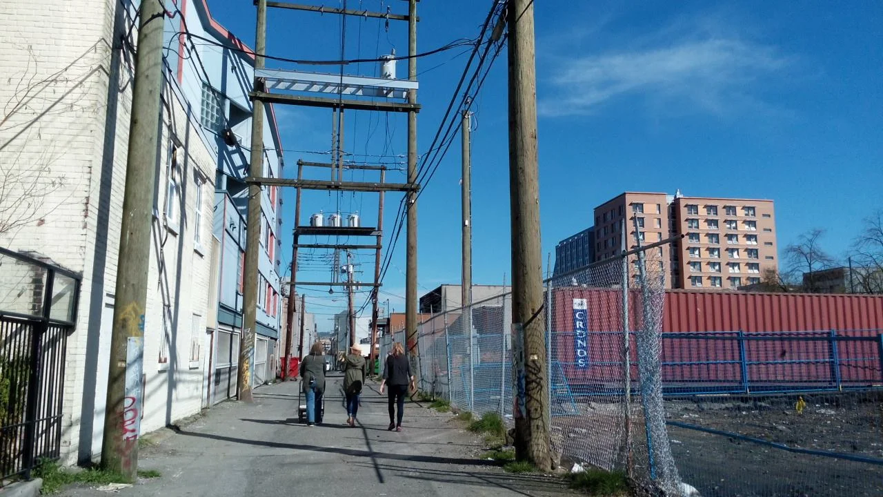 My coworkers walking down a back a DTES alley on International Women's Day 2016