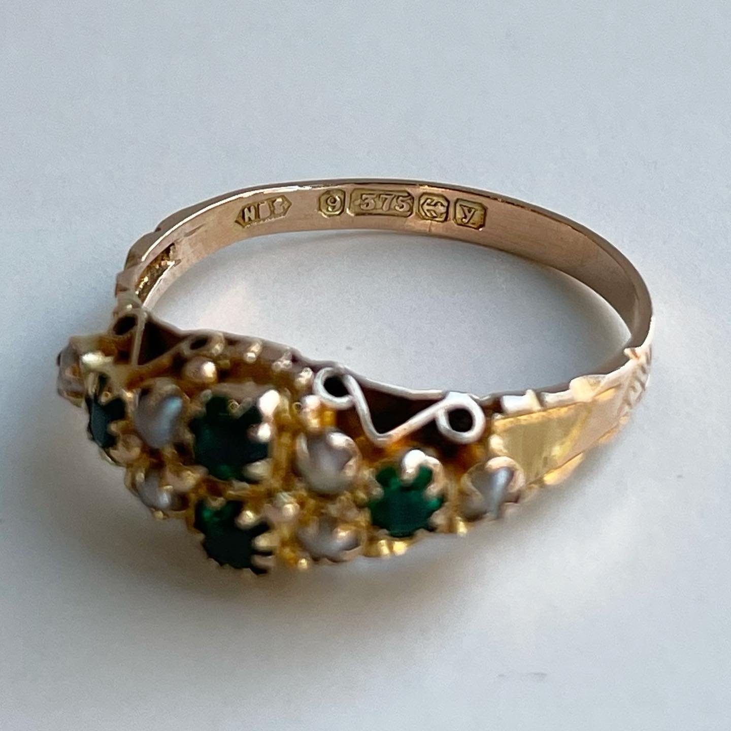 What a gem, truly. Crafted &amp; hand engraved in Birmingham Circa 1923. 9k yellow gold with rectangular emeralds and the sweetest little seed pearls. Available now. Size 7. 
.
.
.
#victorianjewelry #birminghamuk #vintagejewelry #emeraldjewelry #anti