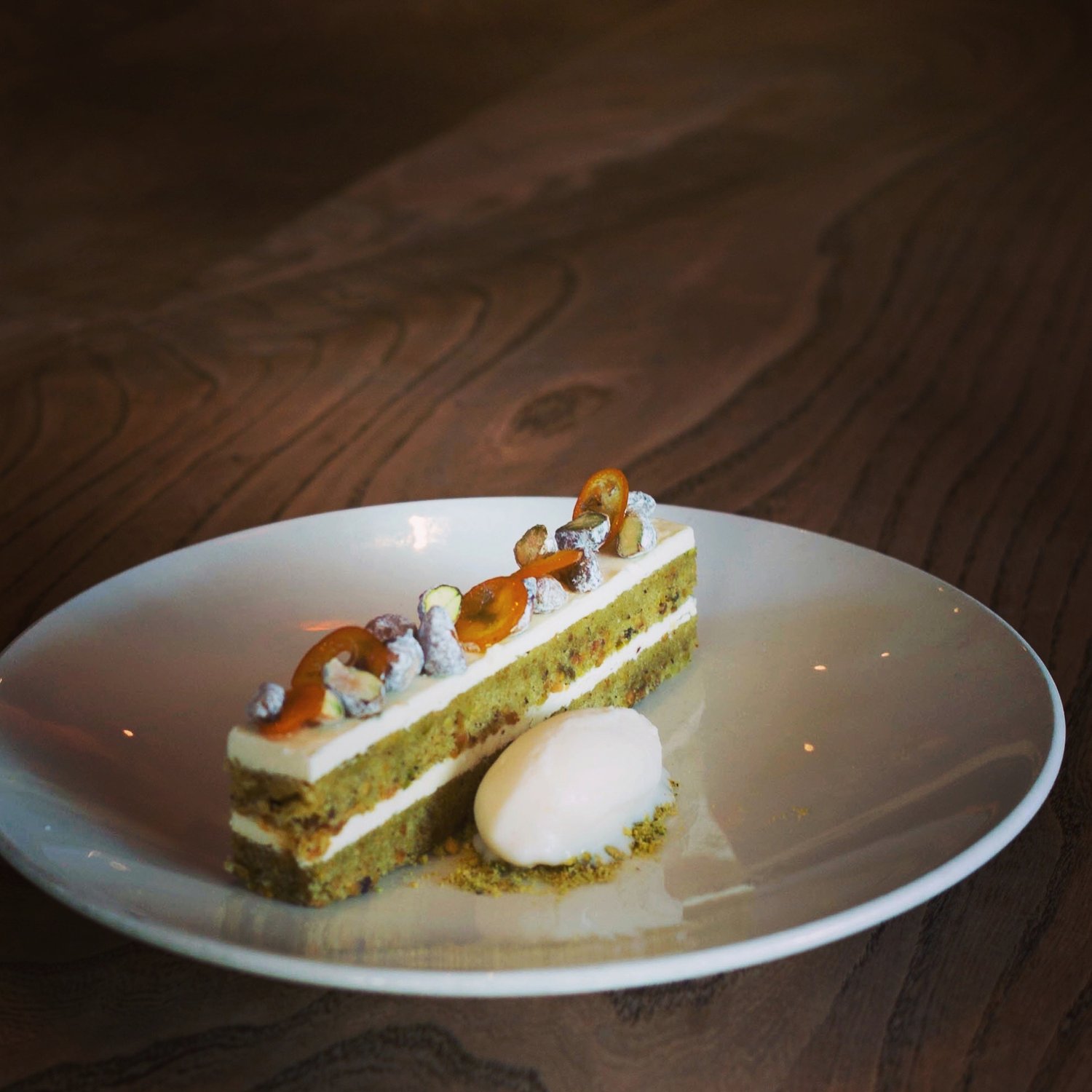 Pistachio Pain De Gene Labneh Buttercream Preserved Kumquats Grapefruit Sherbet Hannah Ziskin