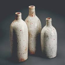 Stoneware bottles with red underglaze