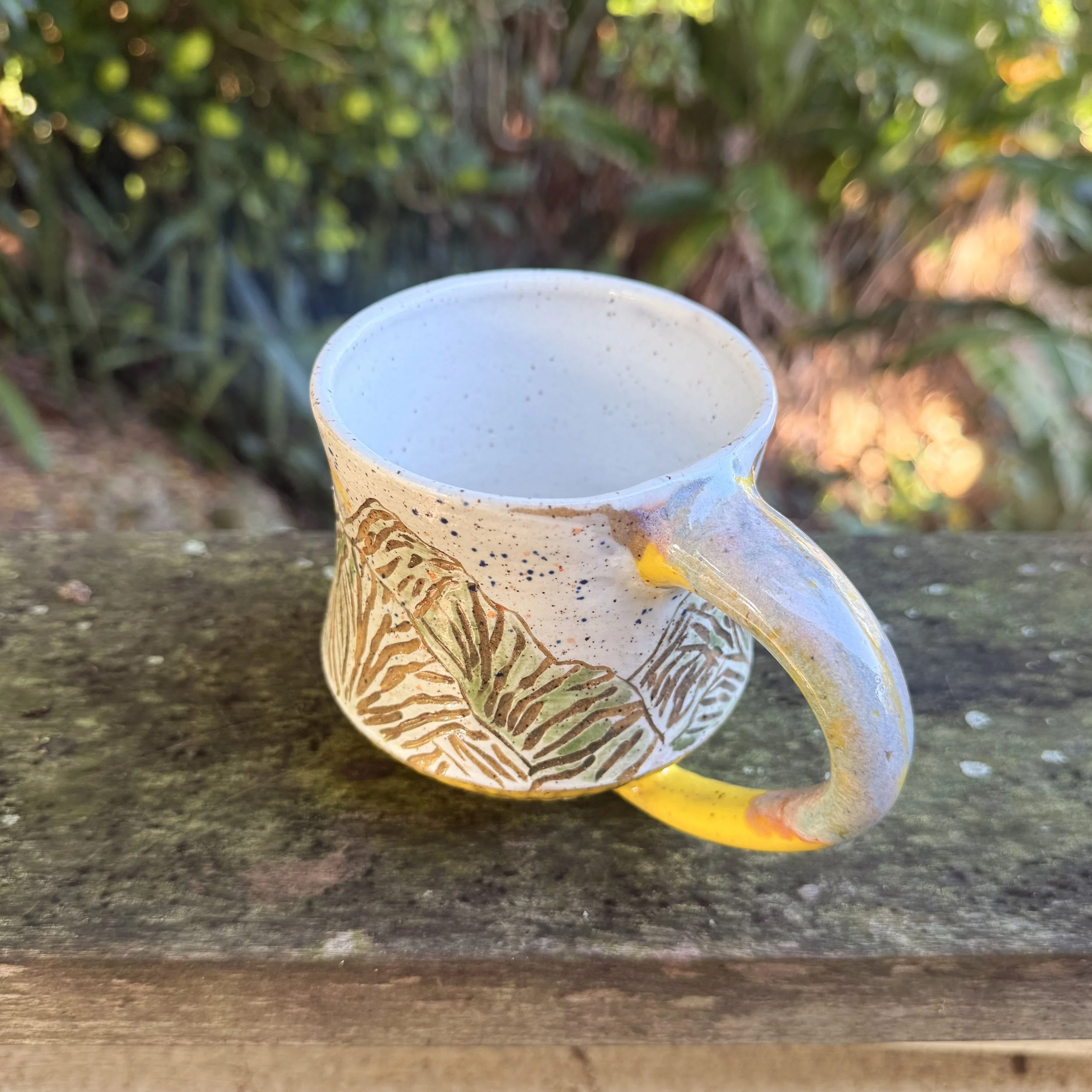 WatercolorYellowCarvedBottomMug4.jpg