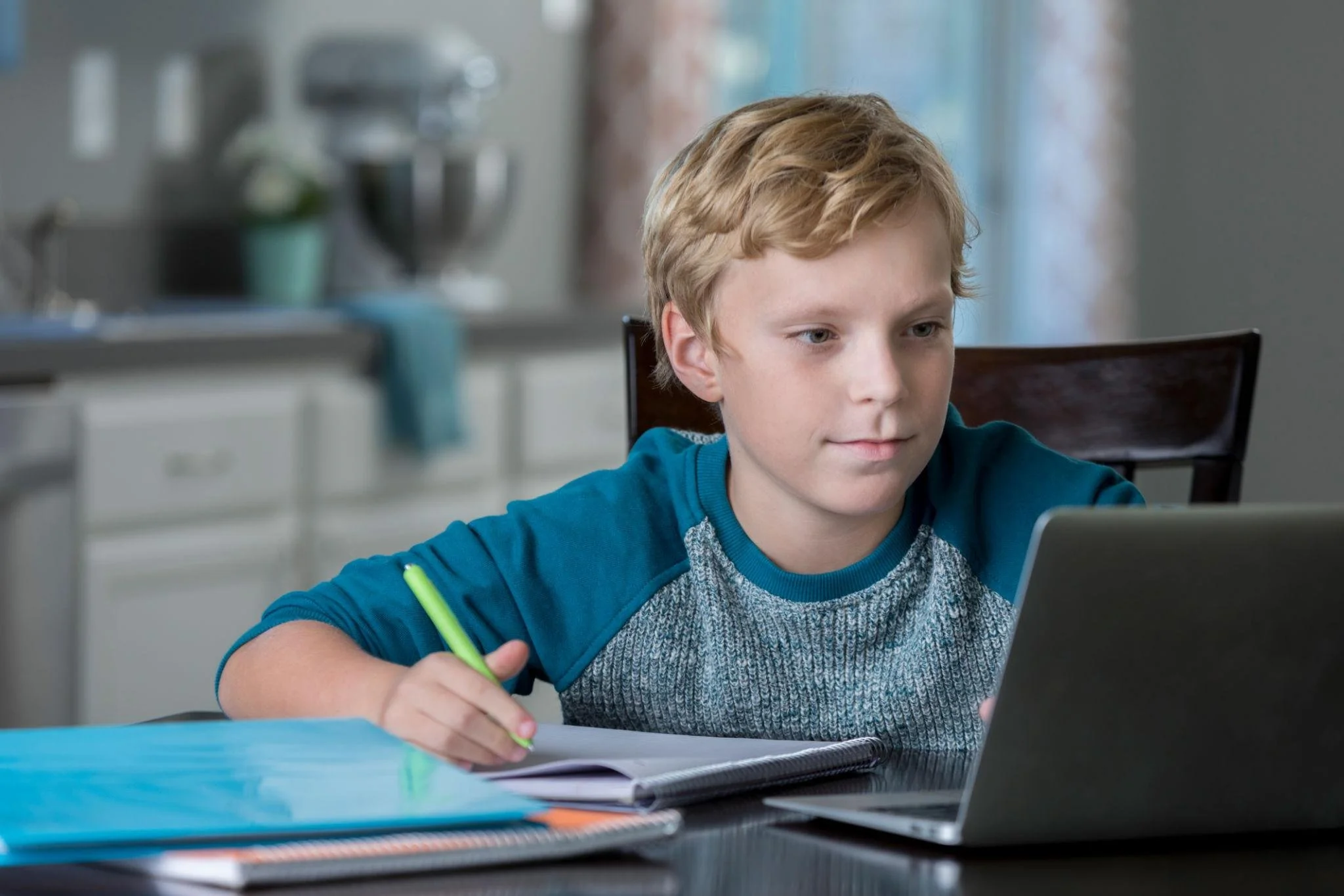 Confident middle school student works on homework