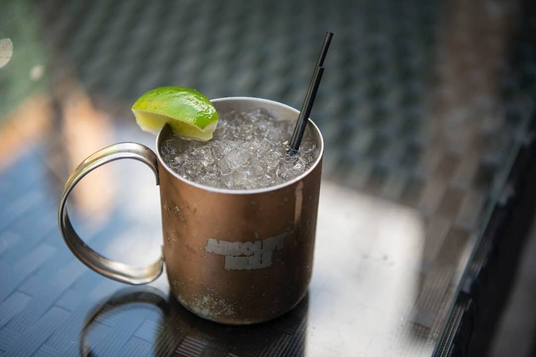 Stay cool with our Absolute Mule!!! Just one of the many awesome cocktails we offer here at SOHA Bar &amp; Grill. Come kick off your weekend with us as we serve from 4-11pm. Dine-in, patio service and carryout. Yeah, buddy.
​.
​#sohabarandgrill #cock