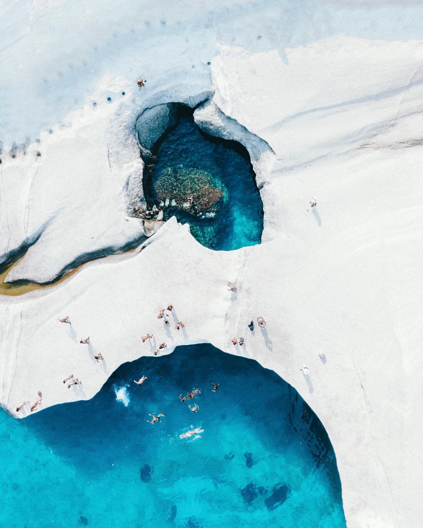 Summer days at Sarakiniko! This place is a dream.. Crystal blue water surrounded by beautiful white rock formations. The perfect culmination of everything a Greek summer should be 🇬🇷💦