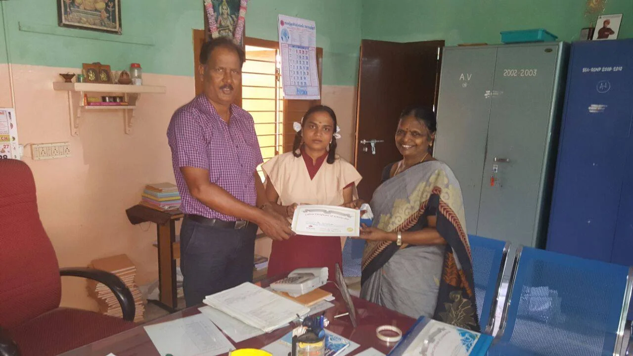 Culvee Scholar receiving Certificate from Culvee Team & Principal
