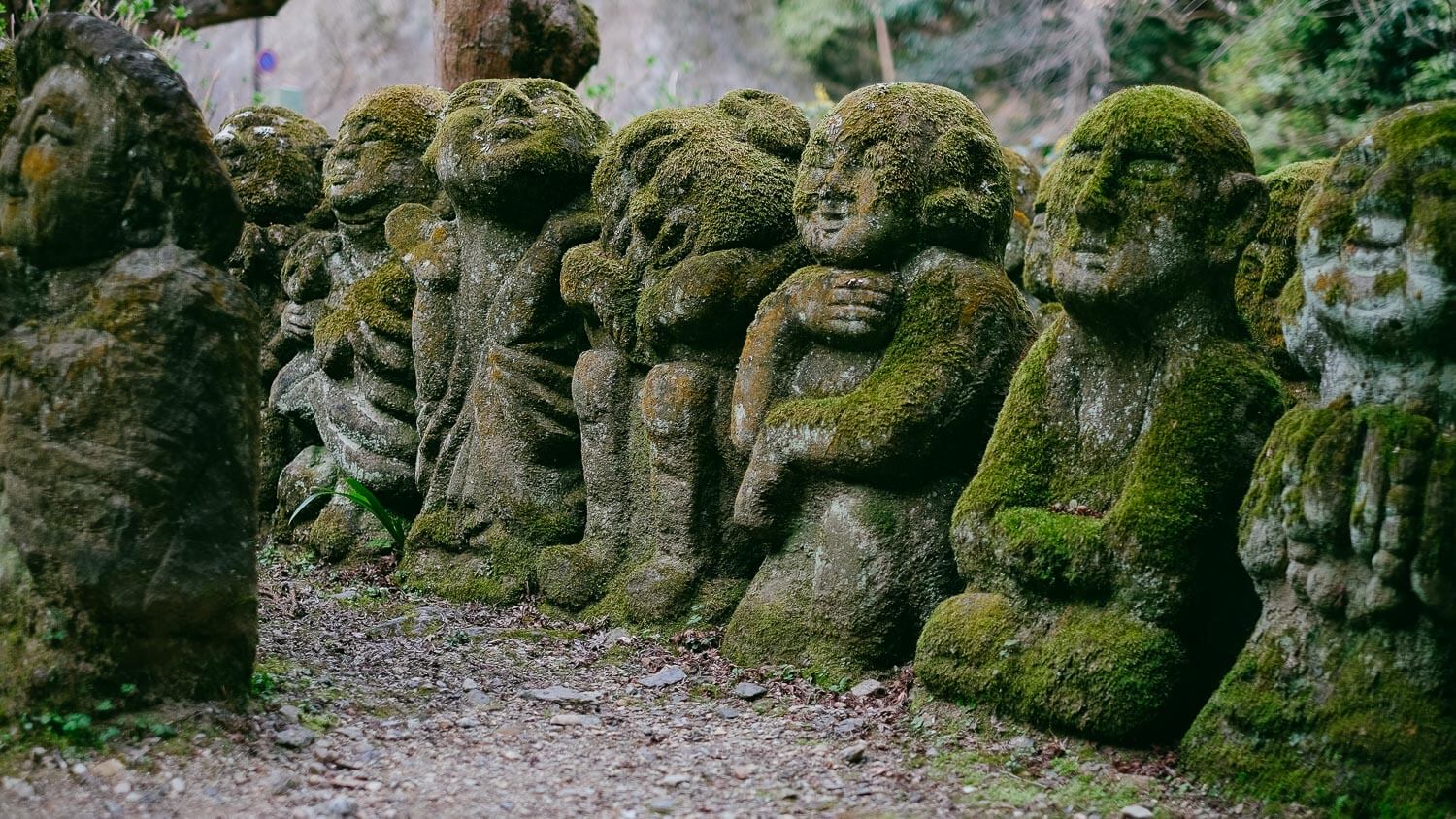 Animated buddhas at Otagi Nenbutsu-Ji, Kyoto. Travel photography and guide by © Natasha Lequepeys for "And Then I Met Yoko". #japan #japanitinerary #travelblog #fujifilm #asia