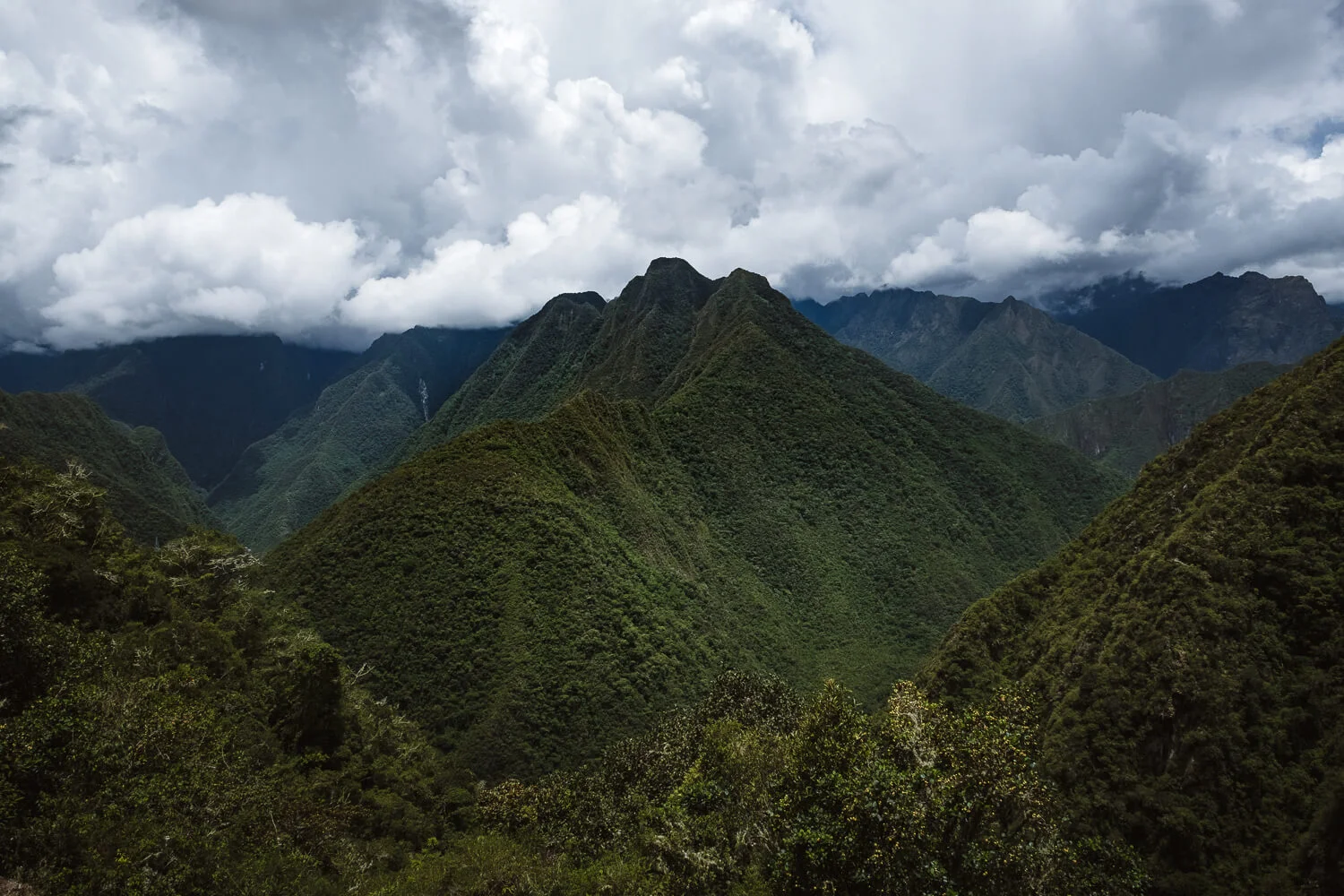 Views along the short Inca trail. Travel photography and guide by © Natasha Lequepeys for "And Then I Met Yoko". #machupicchu #shortincatrail #2dayincatrail #incatrail #aguascalientes #sacredvalley #peru #travelguide #photoblog #travelblog #travelphotography #landscapephotography #travelitinerary #machupicchuitinerary #fujifilm #southamerica #visitperu #dayhike #ancientruins #hiking