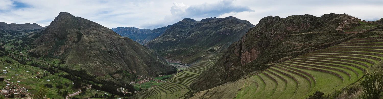 A panoramic view of the city of Pisac and terraces, Cusco. Travel photography and guide by © Natasha Lequepeys for "And Then I Met Yoko". #cusco #peru #travelguide #photoblog #travelblog #travelphotography #landscapephotography #travelitinerary #fujifilm #southamerica #peruitinerary #sacredvalley #incasights #machupicchu #cusco #ancientruins #incatrail #ValleSagrado #travel #cuscoitinerary