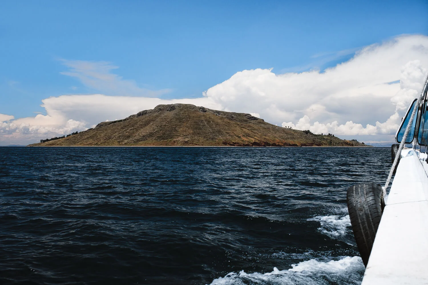 Approaching the islands. Travel photography and guide by © Natasha Lequepeys for "And Then I Met Yoko". #peru #laketiticaca #amantani #taquile #homestay #culturalexperience #photoblog #travelblog #travelphotography #fujifilm #travel #travelperu #southamerica #allwaystravel #laketiticacaitinerary #puno #uros #floatingislands #pachamama #pachatata