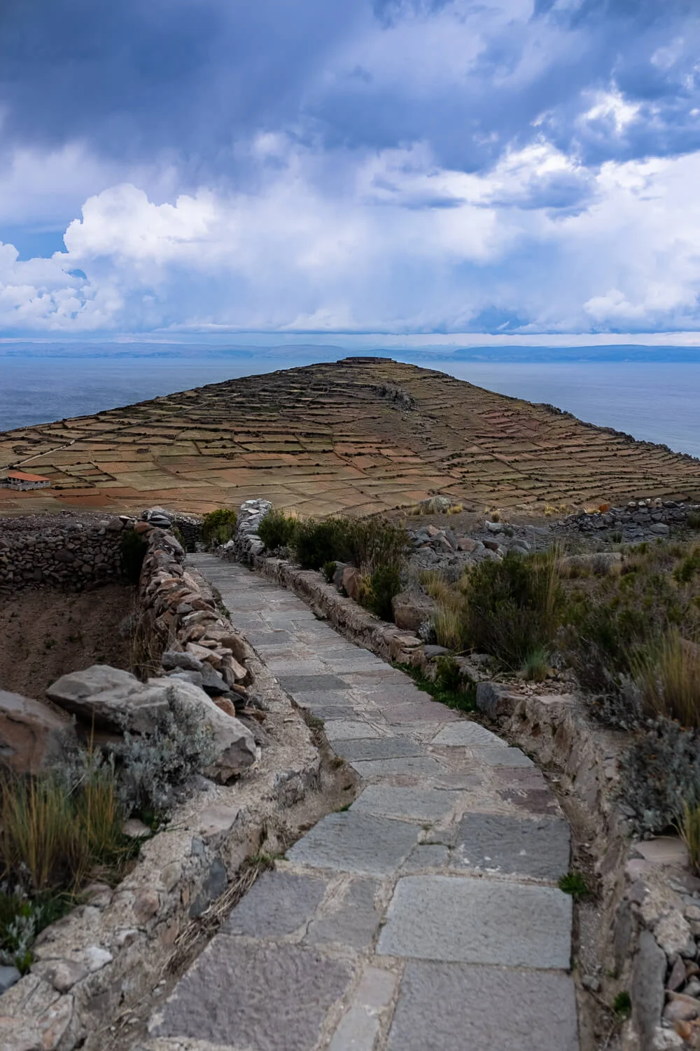 The path to Pachamama on Amantani Island. Travel photography and guide by © Natasha Lequepeys for "And Then I Met Yoko". #peru #laketiticaca #amantani #taquile #homestay #culturalexperience #photoblog #travelblog #travelphotography #fujifilm #travel #travelperu #southamerica #allwaystravel #laketiticacaitinerary #puno #uros #floatingislands #pachamama #pachatata