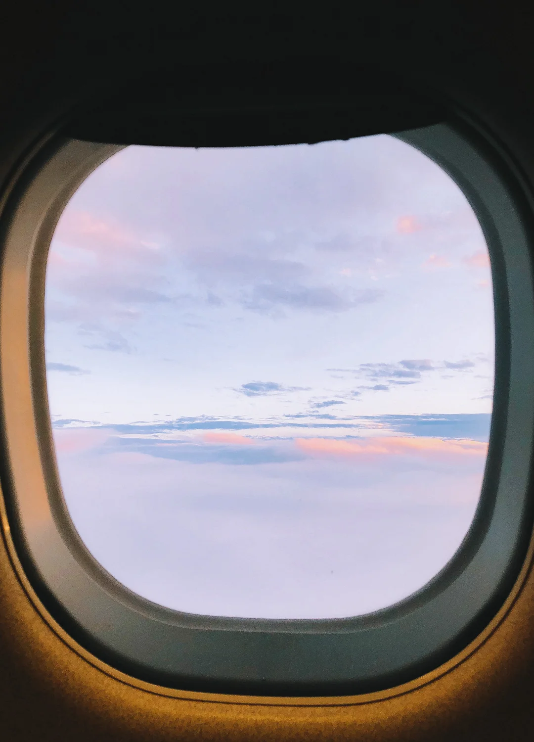 Sunset our a plane window