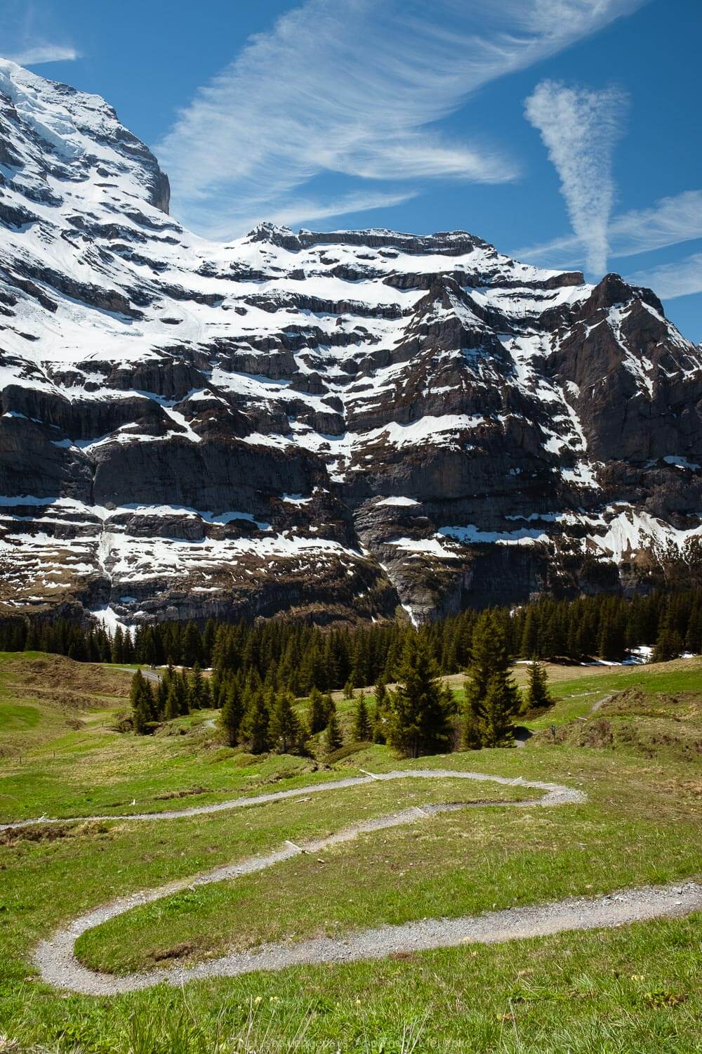 Curved path near Wengernalp, Switzerland. Travel photography and guide by © Natasha Lequepeys for "And Then I Met Yoko". #wengen #switzerland #jungfrau #travelphotography #fujifilm