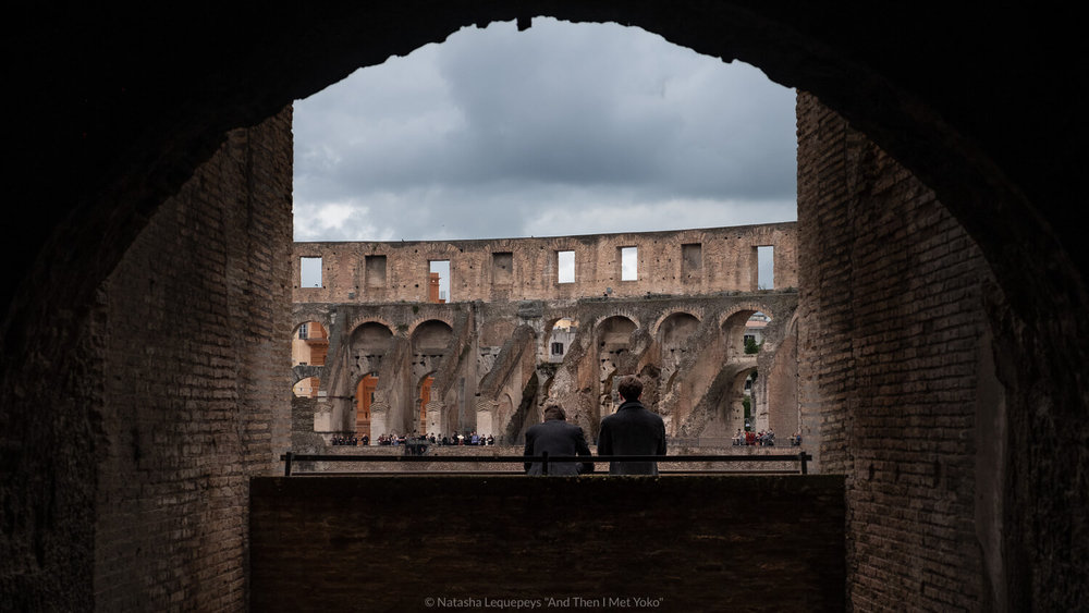 Men looking out in the Colosseum, Rome. Travel photography and guide by © Natasha Lequepeys for "And Then I Met Yoko". #rome #italy #travelblog #travelphotography