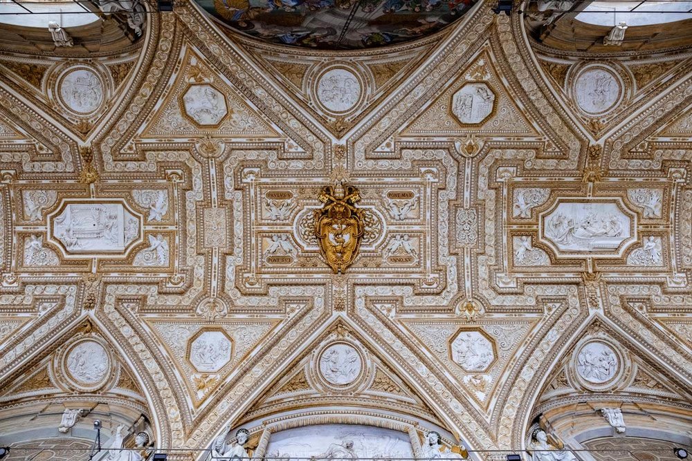 The ceiling outside St Peter's Basilica, Vatican. Travel photography and guide by © Natasha Lequepeys for "And Then I Met Yoko". #rome #italy #travelblog #travelphotography