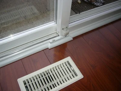 custom residential finishing around sliding glass door.