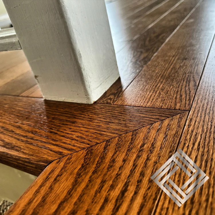Custom hardwood installation with professional stair nosing detail