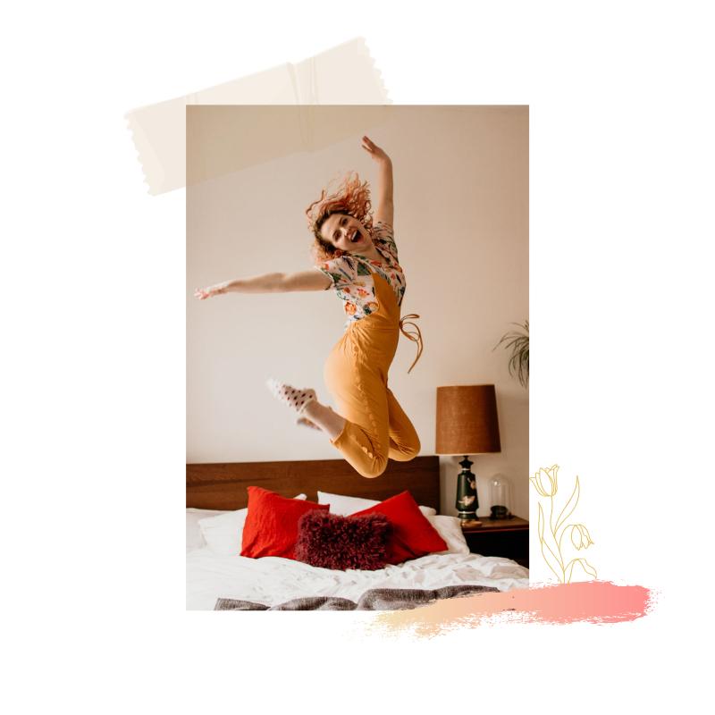 Megan of Megan Maundrell Photography jumping on a bed- Book
