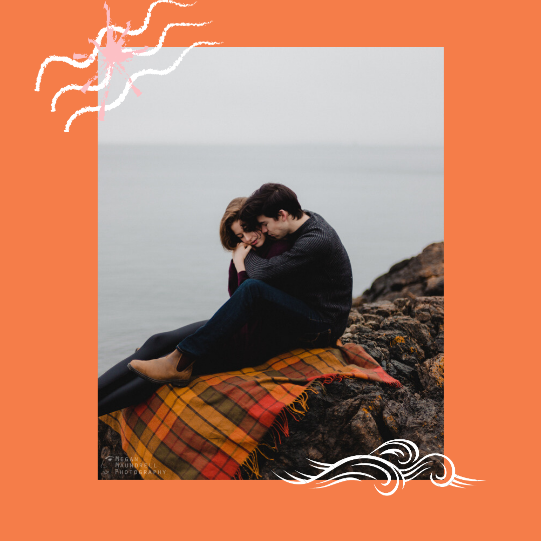 Couple cuddling on the shore of the west coast. PNW couples session. Mat and Alicia - Founders of the creators magazine and their review of megan maundrell Photography.