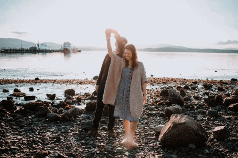 GIF of couple on the beach in golden hour - Megan Maundrell Photography