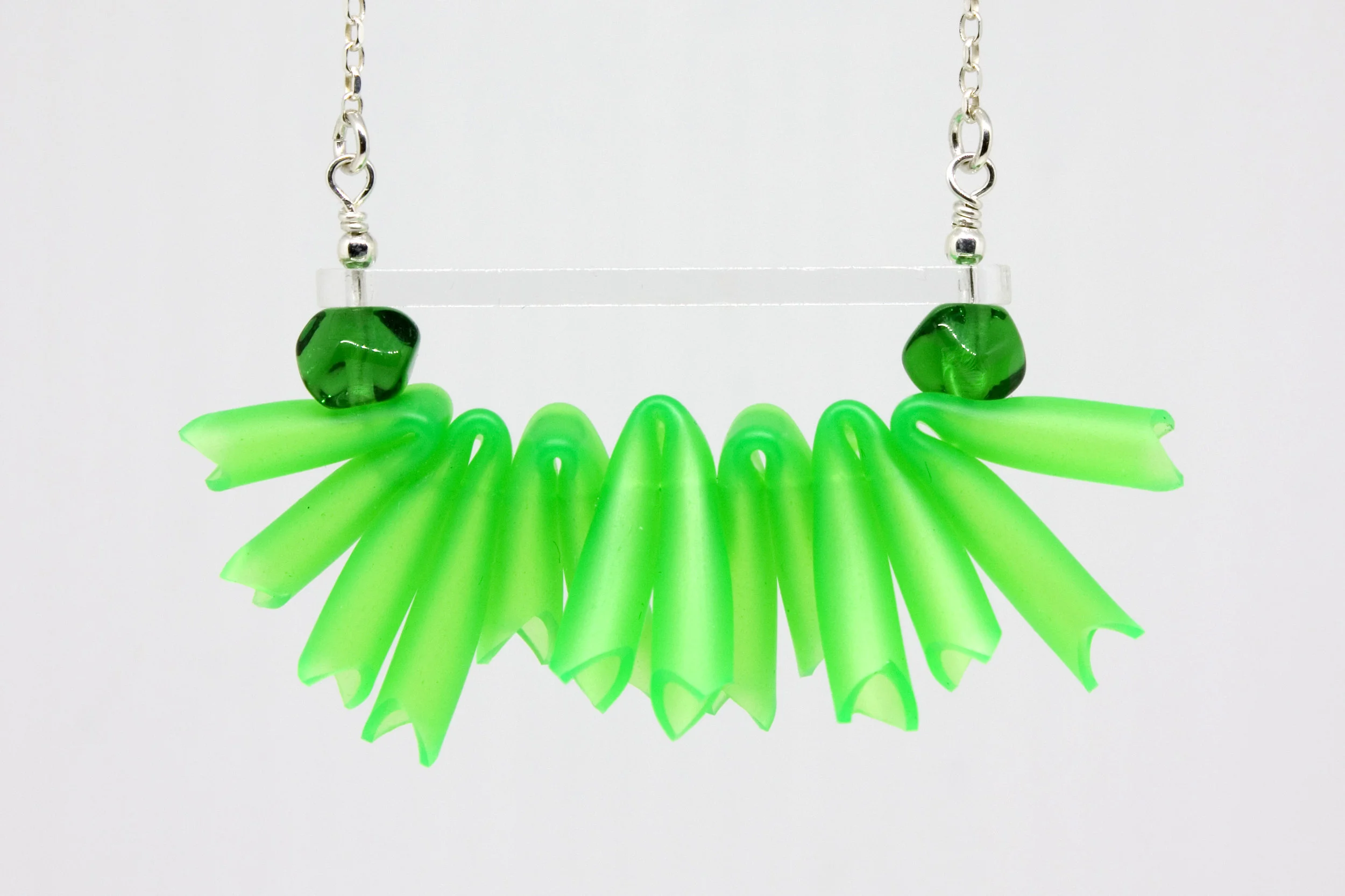 Week 15 - silicone tube, lasercut acrylic, flameworked glass, sterling silver