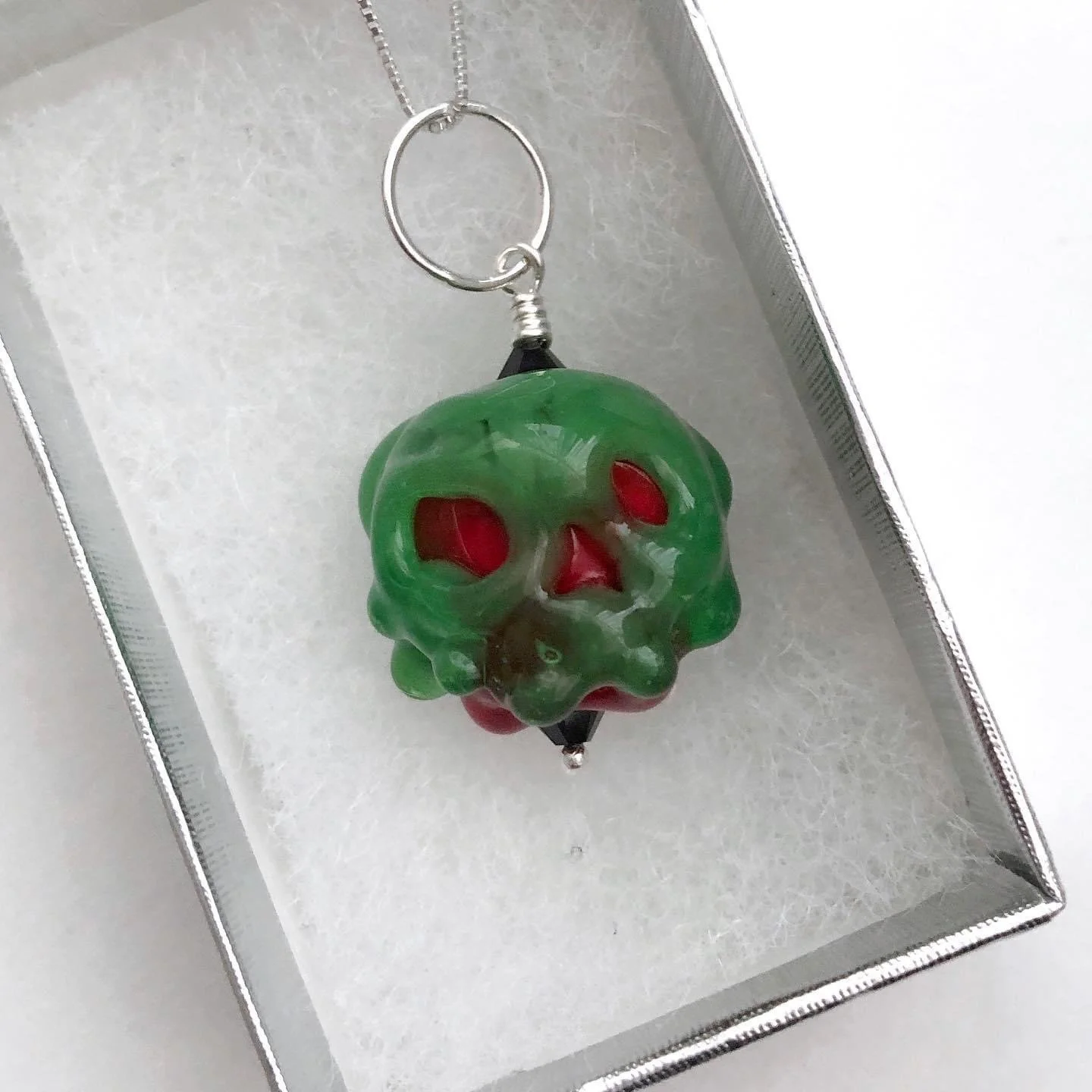 Glass poison apple necklace