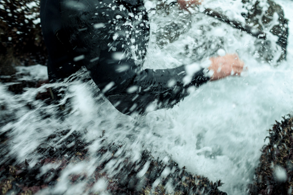 December 20, 2011 - Laxe (La Coruña). A percebeiro gets hit by an unexpected wave. © Thomas Cristofoletti 2011