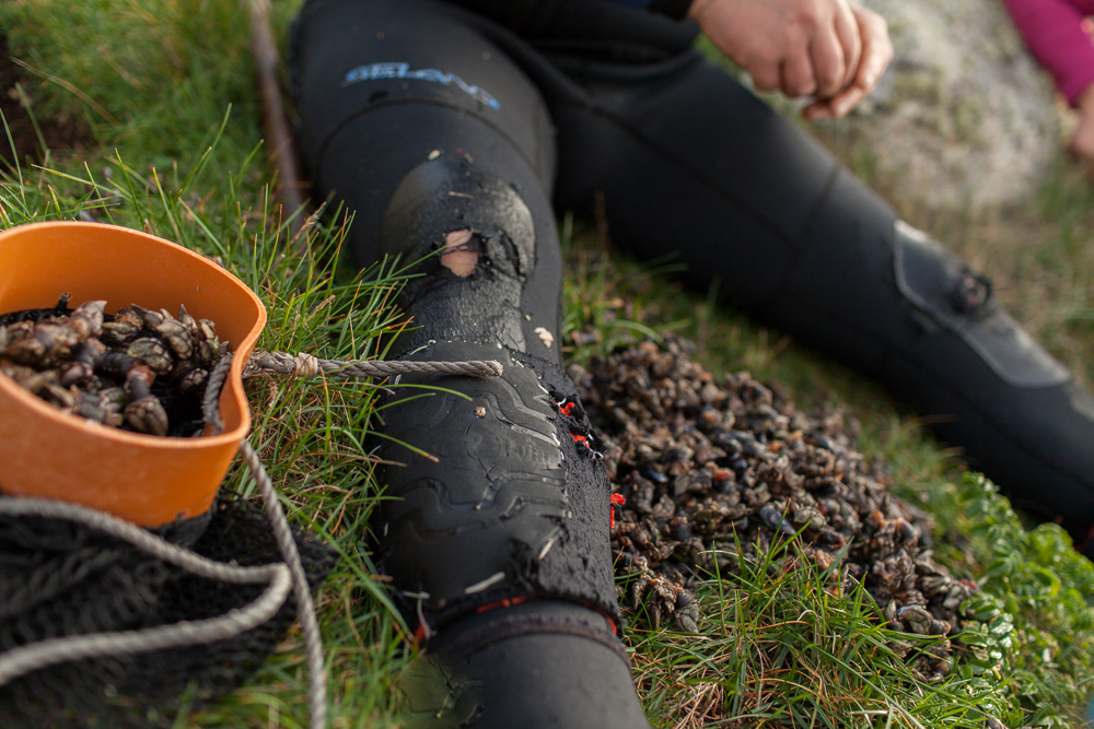 December 12, 2011 - Laxe (La Coruña). Detail of the torn wetsuit of a percebeiro. © Thomas Cristofoletti 2011