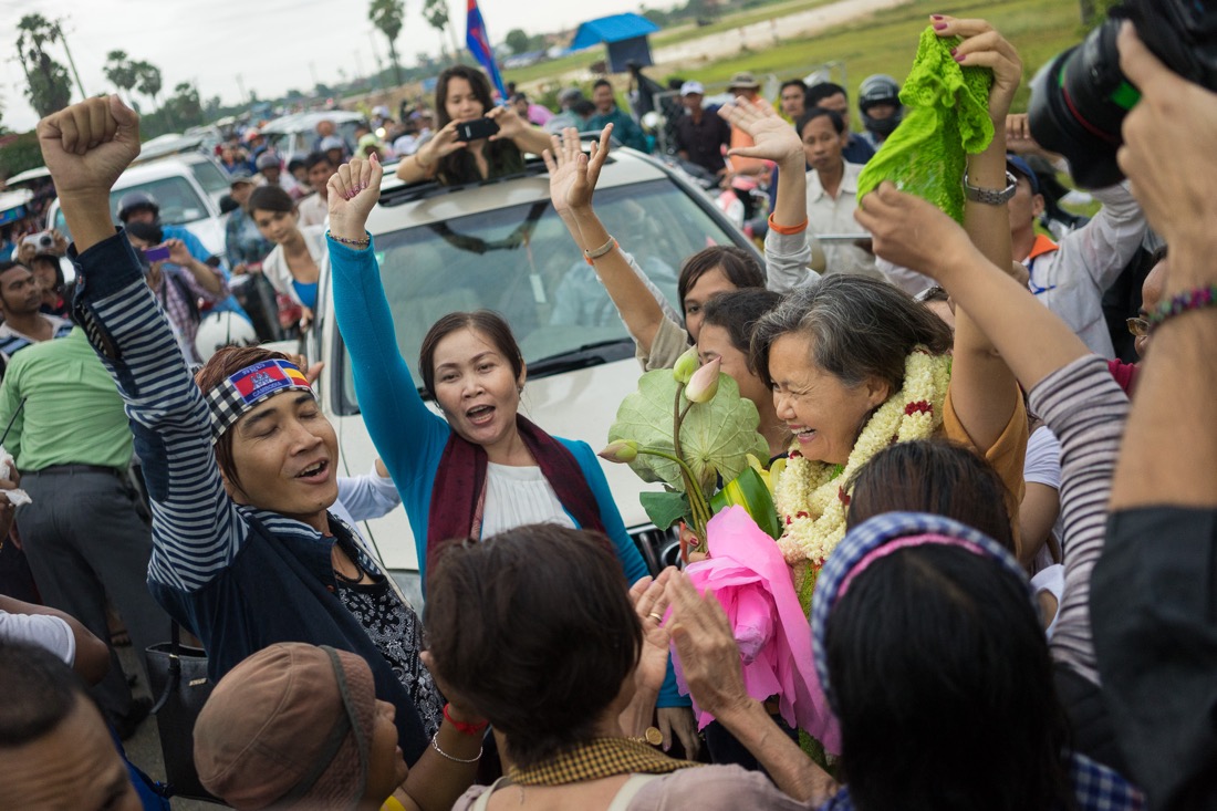 July 22, 2014 - Phnom Penh. CNRP lawmaker-elect Mu Sochua is greeted by opposition supporters after being released on bail from Prey Sar Prison. © Thomas Cristofoletti / Ruom