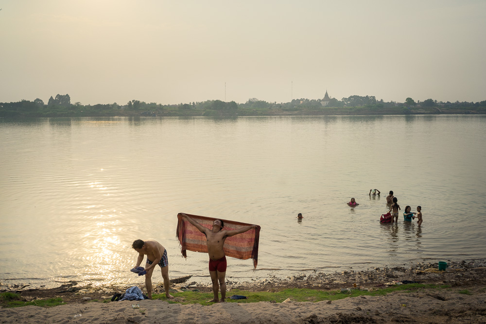 March 16, 2014 - Phnom Penh. Champa’s friends dry themselves after a swim in the Mekong river. Together with Champa, they were participating in the 80th birthday party that their lesbian friends organized for their mother. © Thomas Cristofoletti