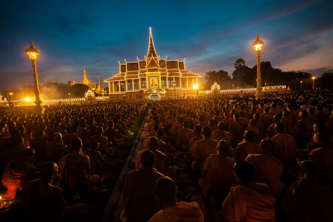 Monks pay respect for the death of Cambodian king Norodom Sihanouk.
