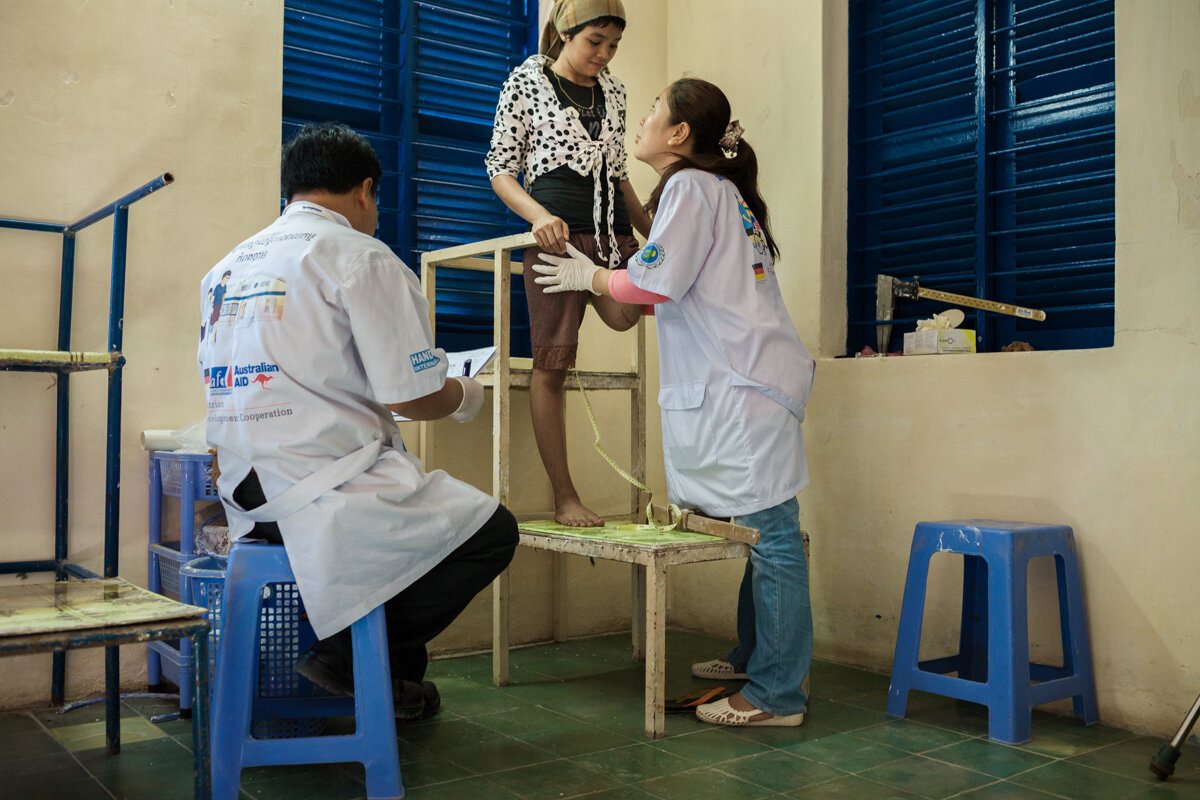  November 29, 2013 - Handicap International Rehabilitation Center (Kampong Cham). Dott. Chai Borany (27) measures a patient's amputation to fit a prostethic leg. She is one of the 70 Cambodians who graduated at the CSPO (The Cambodia School of Prosth