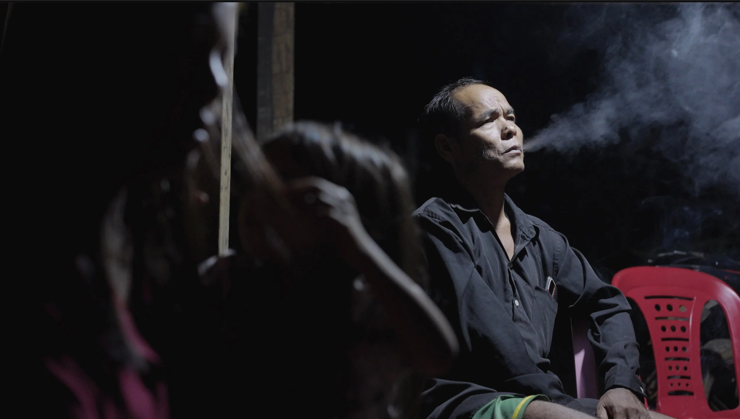 Strangled a film documentary  about 3 Cambodian families struggling with microfinance debt 