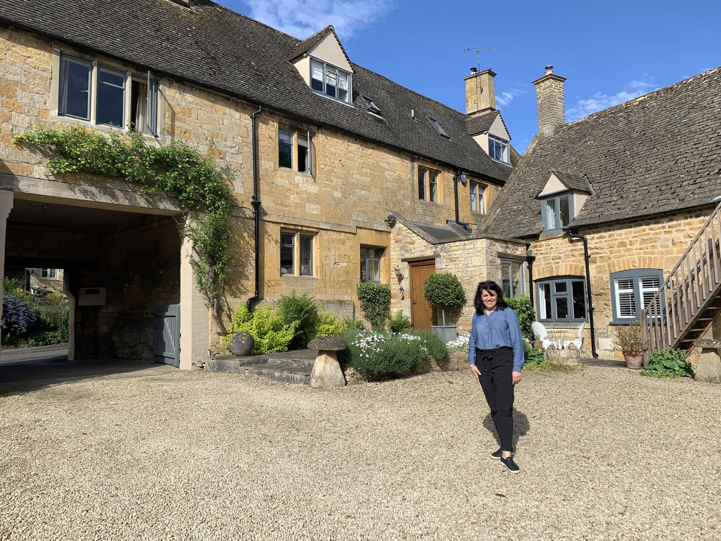 Seriously, how pretty is this AirBnB??? Arches, stonework, painted windows, landscaping, even the pea gravel car park—just lovely!