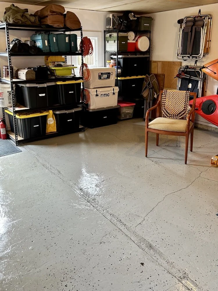 Clean, organized garage after decluttering, creating a functional and productive space.