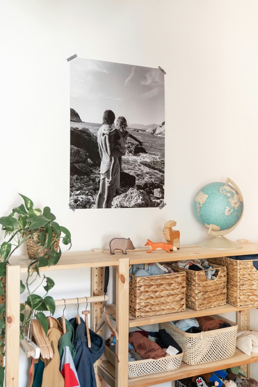 Organized kids room with baskets and hanging clothes designed for easy, everyday use.