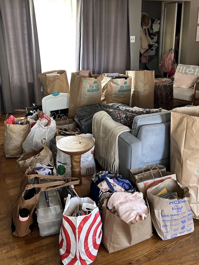 Organized donation pile after a home decluttering and editing session.