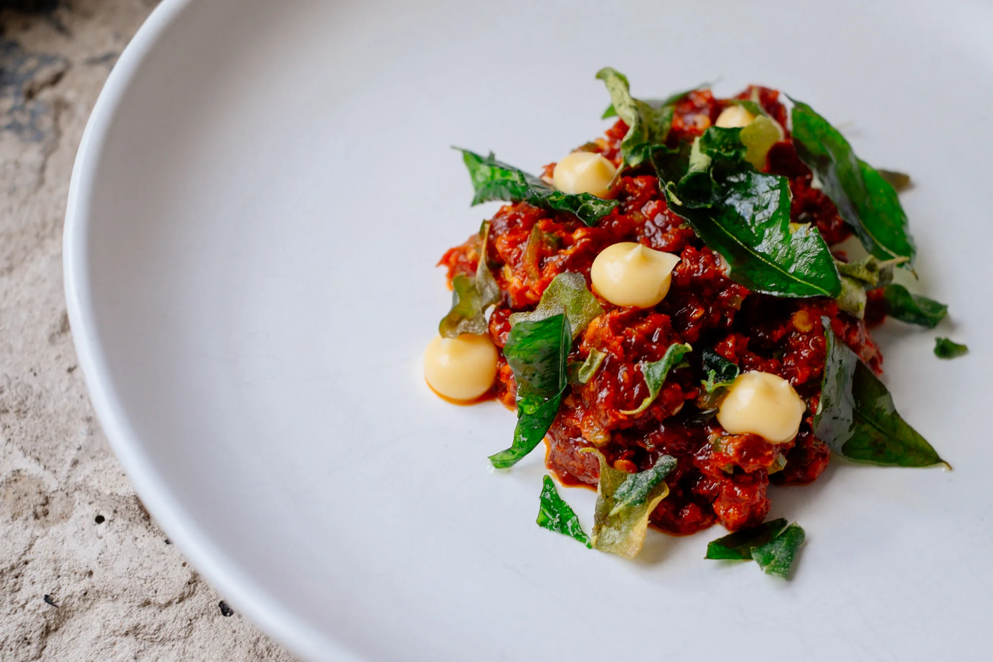 Chopped Kangaroo, Bone Marrow, Pickled Chilli, Saltbush.