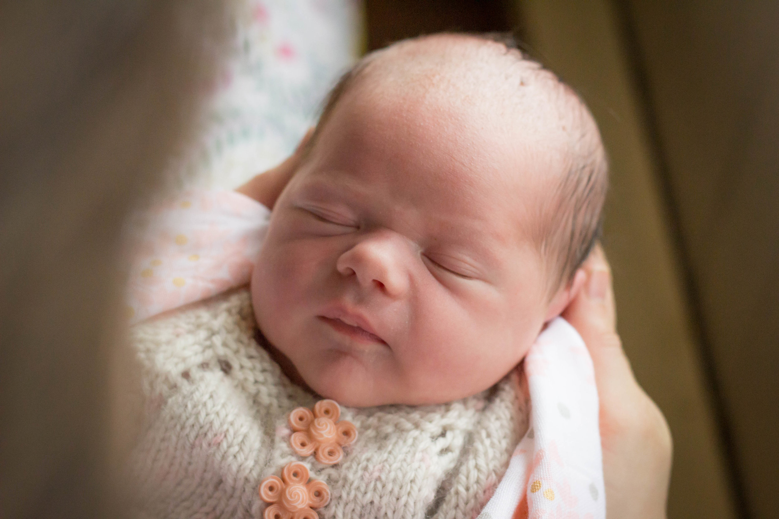 newborn baby girl in moms arms | Jaime Bugbee Photography