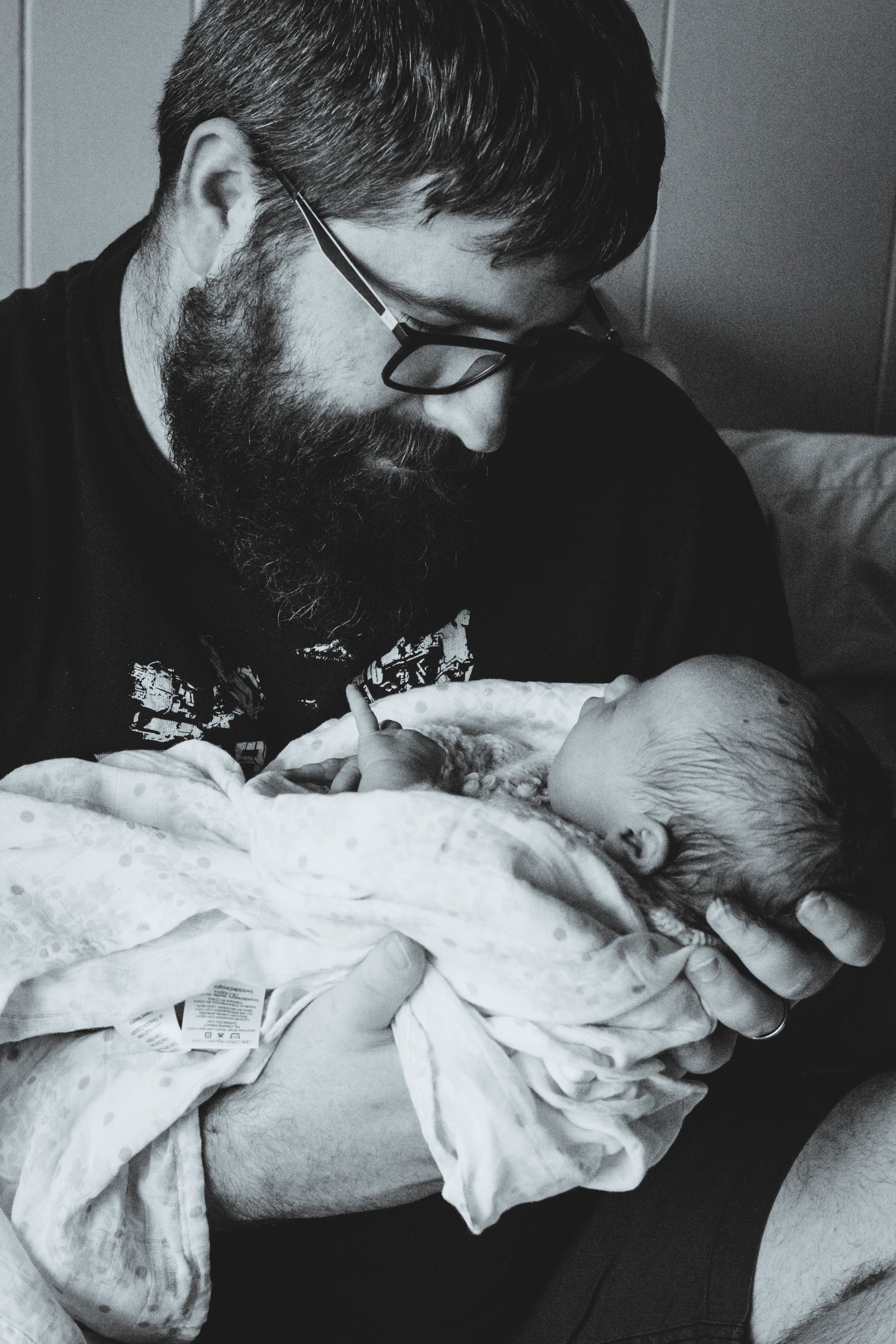 Dad holding newborn baby | Jaime Bugbee Photography