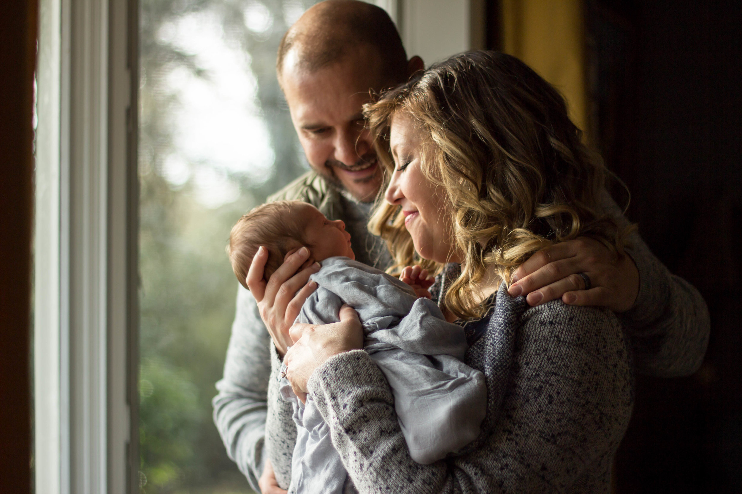 Couple with newborn baby | Jaime Bugbee Photography