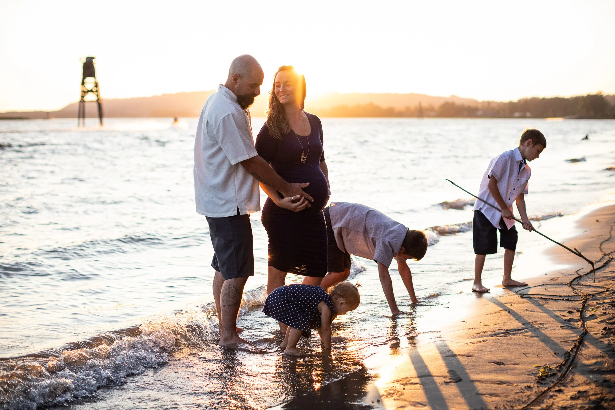 “This was the funnest pictures we ever had!” from the kids pictured here. It means so much to hear that they enjoyed it while mom and dad are relaxed as well. Scroll down to see more from this families fun Columbia River Gorge beach maternity photog…