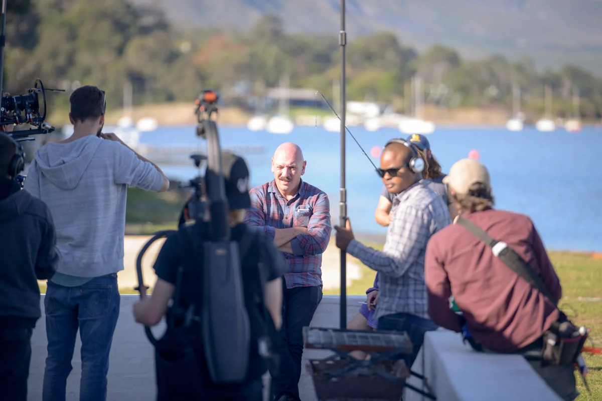 Alyzzander Fourie as Boors and director, Christiaan Olwagen