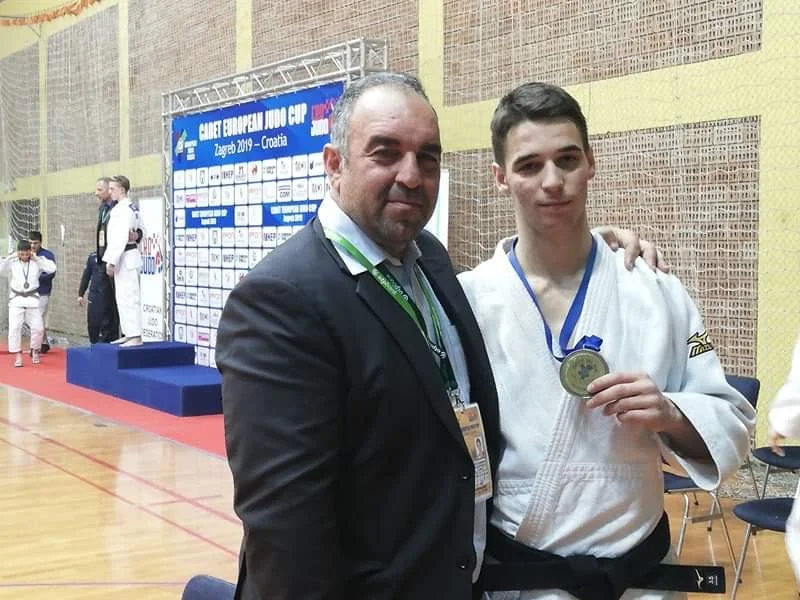 Bronze medalist Kyprianos Andreou pictured with coach and father Marios Andreou