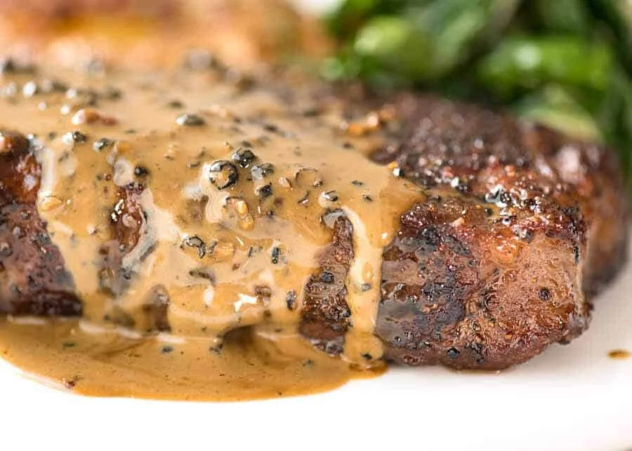 Scotch fillet with peppercorn sauce and herb mash