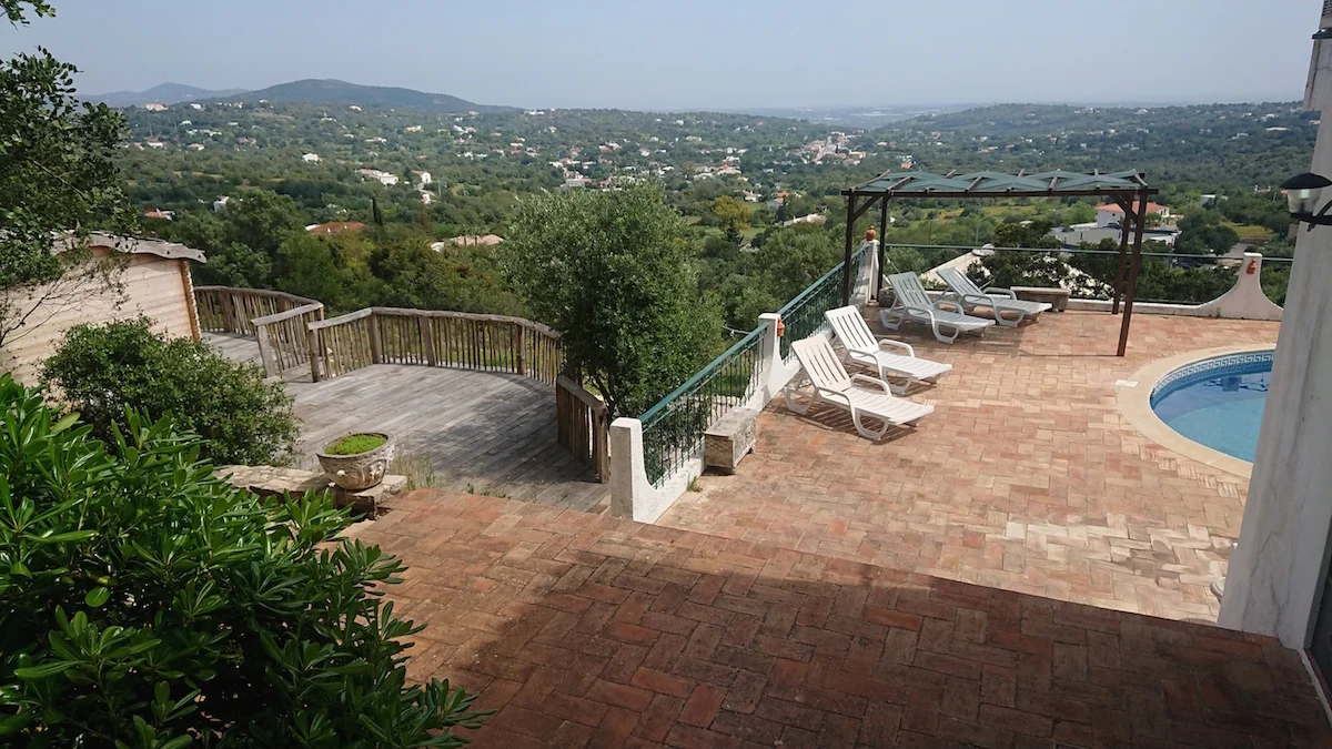 View of pool and massage cabin deck areas