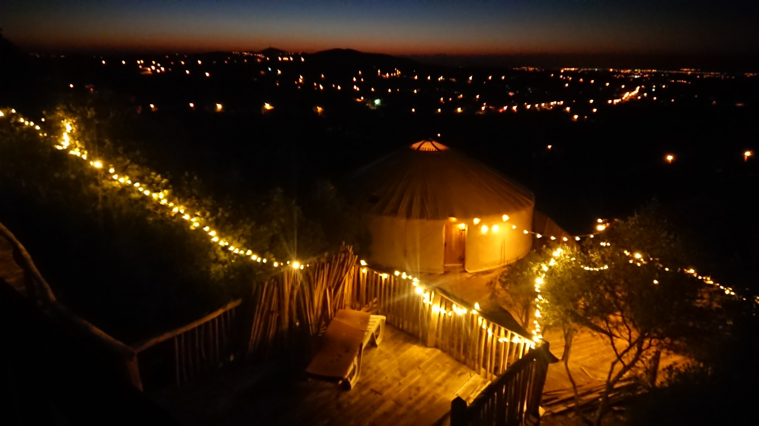 yurt and ecohut from pool area.JPG