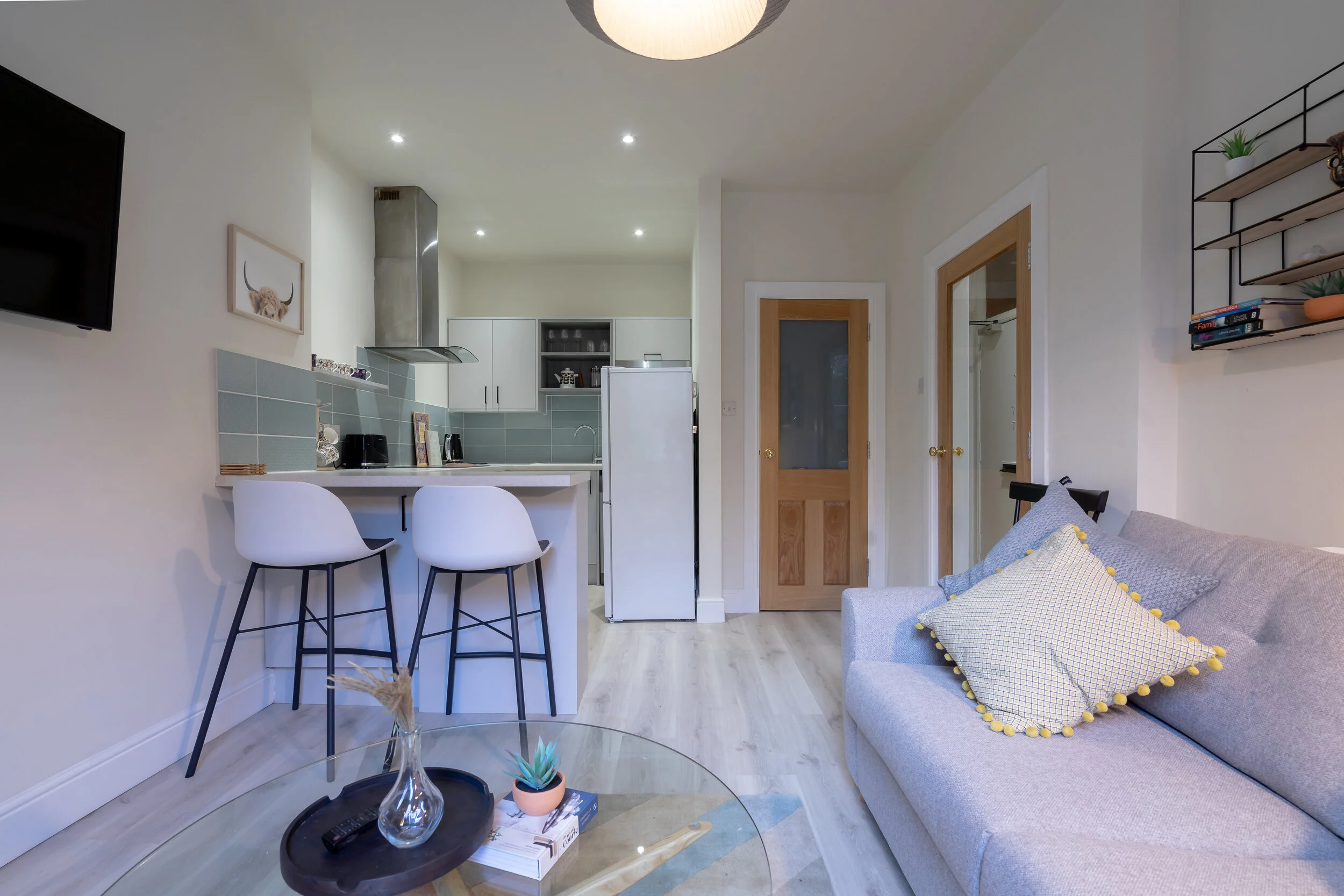 The colour scheme is carefully chosen in this flat designed by Edinbrugh based interior designer Denise, with yellow as accent